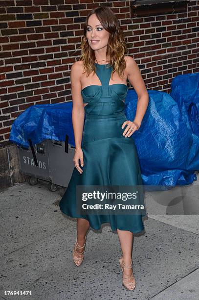 Actress Olivia Wilde leaves the "Late Show With David Letterman" taping at the Ed Sullivan Theater on August 19, 2013 in New York City.