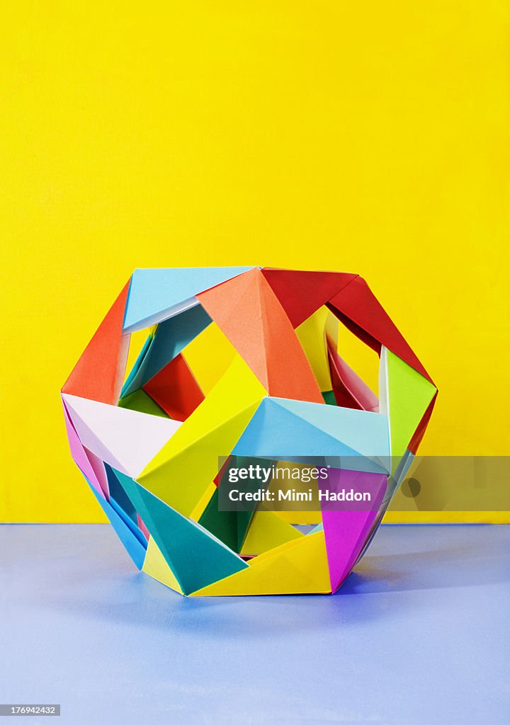 Modular Origami Sculpture on Colorful Background