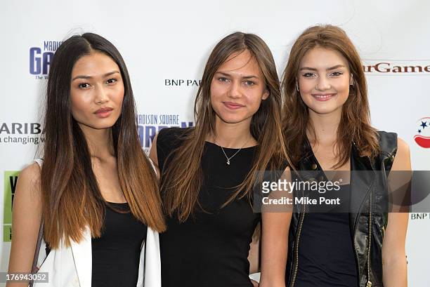 Models Yulia Saparniyazova, Marta Stempniak and Vika Levina attend the 7th Annual BNP Paribas Showdown Announcement at Local West on August 19, 2013...
