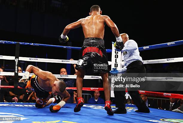 Danny Jacobs knocks out Giovanni Lorenzo in the third round of their Junior Middleweight fight at Best Buy Theater on August 19, 2013 in New York...