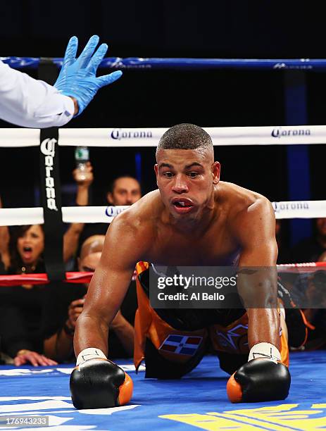 Giovanni Lorenzo is knocked out in the third round against Danny Jacobs during their Junior Middleweight fight at Best Buy Theater on August 19, 2013...