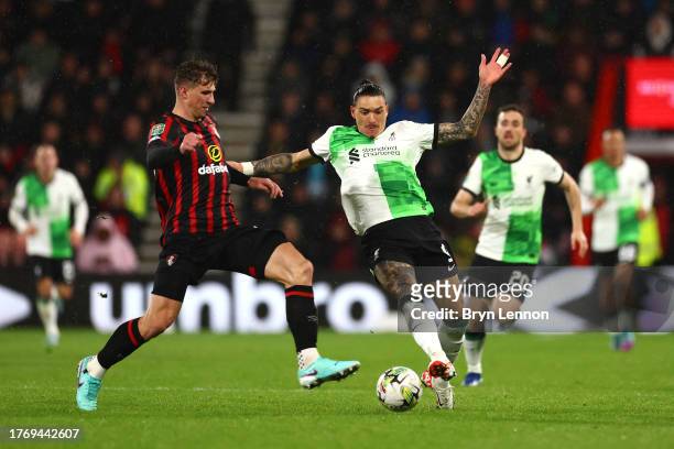 Illia Zabarnyi of AFC Bournemouth challenges for the ball with Darwin Nunez of Liverpool during the Carabao Cup Fourth Round match between AFC...