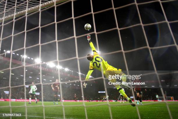 Ionut Andrei Radu of AFC Bournemouth stretches but fails to save the shot of Darwin Nunez of Liverpool for the second goal during the Carabao Cup...