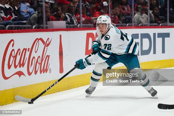 William Eklund of the San Jose Sharks skates with the puck against the Washington Capitals during the first period of the game at Capital One Arena...