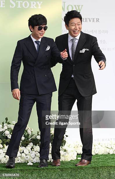 Kim Min-Jong and Kim Su-Ro attend Lee Byung-Hun and Lee Min-Jung's wedding at Grand Hyatt Hotel on August 10, 2013 in Seoul, South Korea.