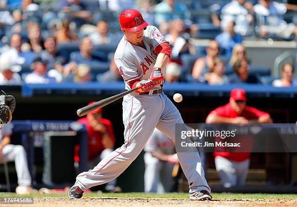 Mark Trumbo of the Los Angeles Angels of Anaheim in action against the New York Yankees at Yankee Stadium on August 15, 2013 in the Bronx borough of...