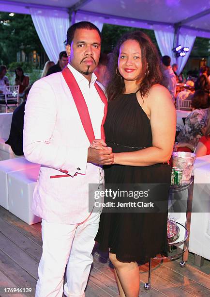 Johnny Nunez and Dr. Angelique Anderson Nunez attend the 2nd annual Compound Foundation Fostering A Legacy Benefit on August 17, 2013 in East...