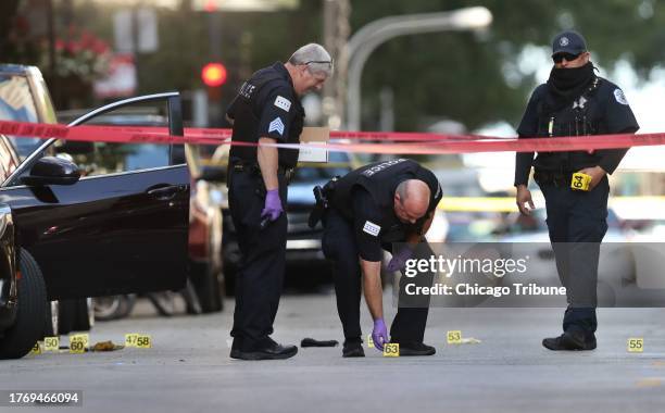 Chicago police investigate the scene of a fatal shooing in the first block of East Oak Street in the Gold Coast neighborhood on Aug. 4, 2020. Carlton...