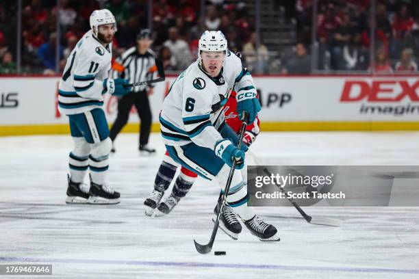 Ty Emberson of the San Jose Sharks skates with the puck against the Washington Capitals during the third period of the game at Capital One Arena on...