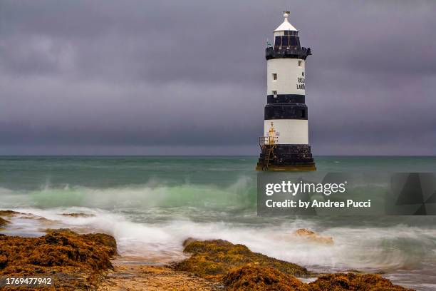 trwyn du lighthouse, penmon, wales, united kingdom - du stock pictures, royalty-free photos & images