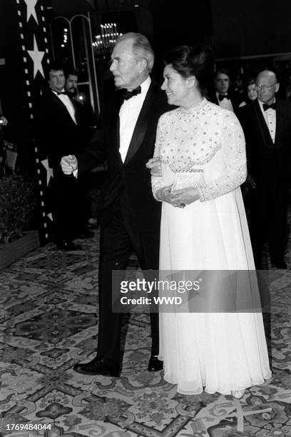 James Mason and Clarissa Kaye attend an American Film Institute event at the Beverly Hilton Hotel in Beverly Hills, California, on March 3, 1983.
