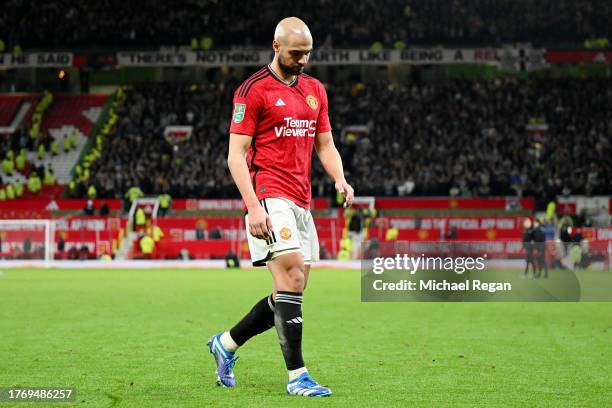 Sofyan Amrabat of Manchester United looks dejected following their sides defeat in the Carabao Cup Fourth Round match between Manchester United and...