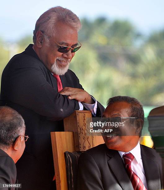 East Timorese Prime Minister Xanana Gusmao and President Taur Matan Ruak chat during a ceremony to mark the 38th anniversary of the Falintil, the...