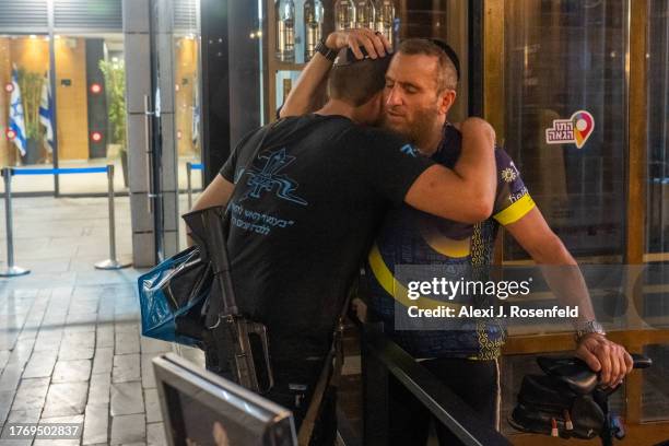 Rabbi Shmuley Boteach embraces a friend before he goes into military service on November 01, 2023 in Tel Aviv, Israel. In the wake Hamas's attacks...