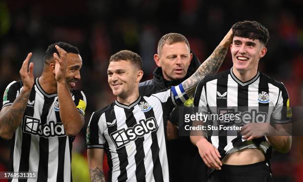 Newcastle United captain Kieran Trippier congratulates Tino Livramento after the the Carabao Cup Fourth Round match between Manchester United and...