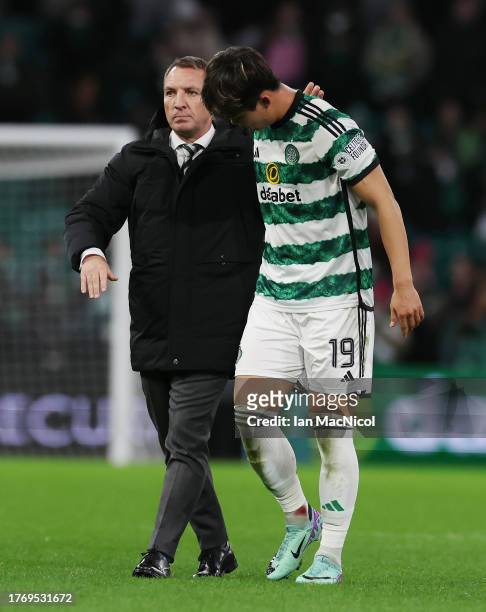 Brendan Rodgers and Hyeongyu Oh are seen during the Cinch Scottish Premiership match between Celtic FC and St. Mirren FC at Celtic Park Stadium on...