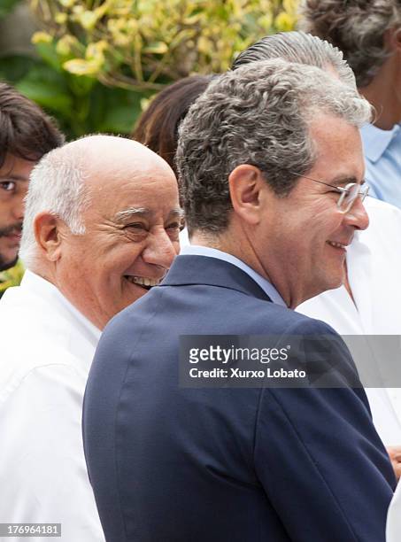 Pablo Isla, president of Inditex and Amancio Ortega, owner of Zara, attend Rosalia Mera's funeral on August 17, 2013 in Oleiros, Spain.