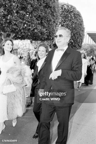 Trish Van Devere and George C. Scott attend the 55th Academy Awards at the Dorothy Chandler Pavillion in Los Angeles, California, on April 11, 1983.