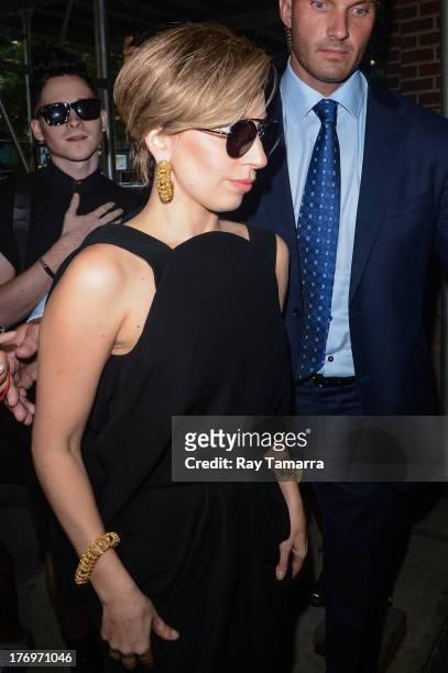 Singer Lady Gaga enters the Z100 Studios on August 19, 2013 in New York City.