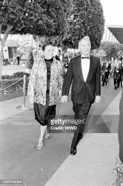 Clarissa Kaye and James Mason attend the 55th Academy Awards at the Dorothy Chandler Pavillion in Los Angeles, California, on April 11, 1983.
