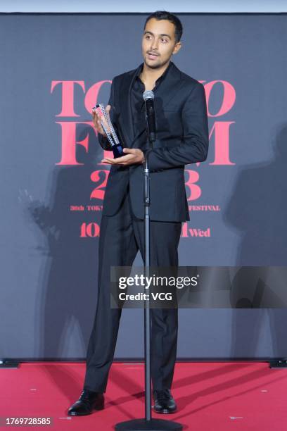 Iranian actor Yasna Mirtahmasb speaks after receiving the award for Best Actor for "Roxana" during the closing ceremony of the 36th Tokyo...