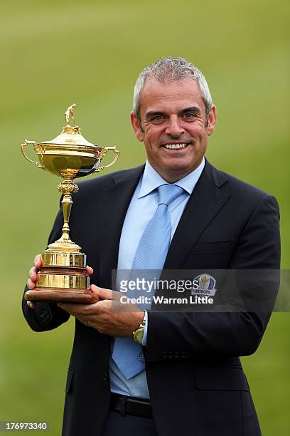 Paul McGinley, European Ryder Cup Captain poses with the Ryder Cup during a photocall to announce The McGinley Foundation as the Fourth and final...