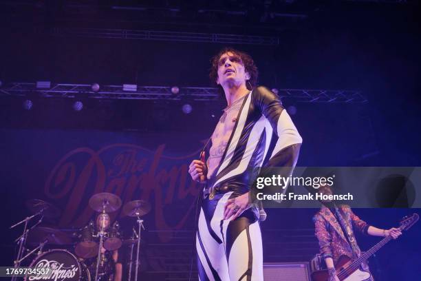 Justin Hawkins and Frankie Poullain of the British band The Darkness perform live on stage during a concert at the Admiralspalast on November 7, 2023...