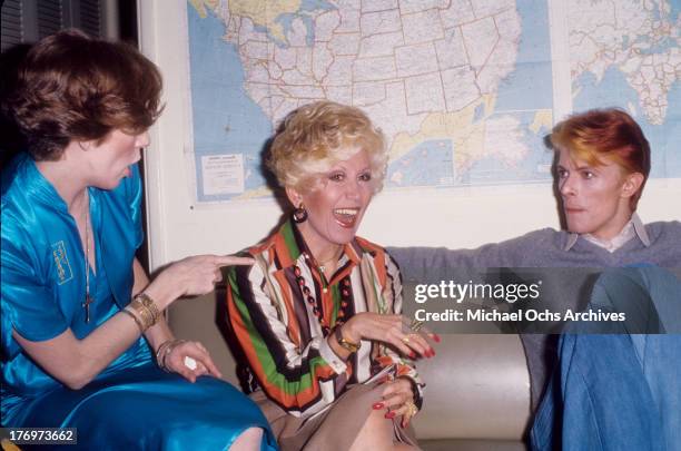 David Bowie, Rona Barrett and Angela Bowie backstage on 'Good Morning America' by Rona Barrett in February, 1976 in Los Angeles, California.