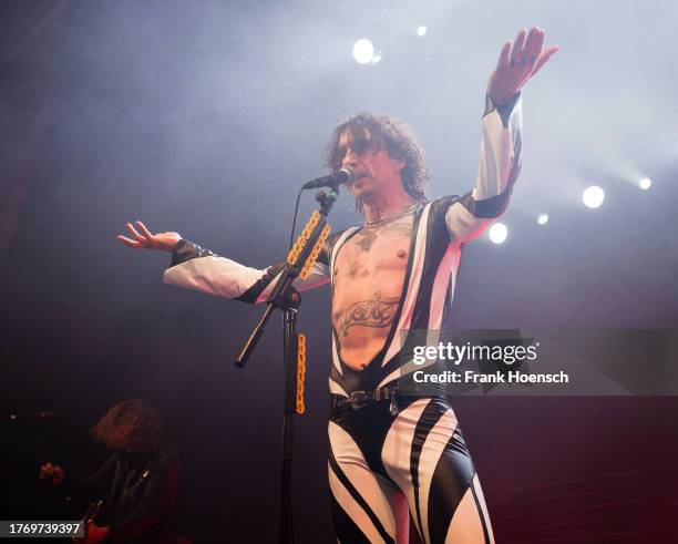 Singer Justin Hawkins of the British band The Darkness performs live on stage during a concert at the Admiralspalast on November 7, 2023 in Berlin,...