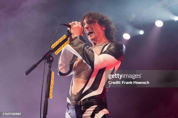 Singer Justin Hawkins of the British band The Darkness performs live on stage during a concert at the Admiralspalast on November 7, 2023 in Berlin,...