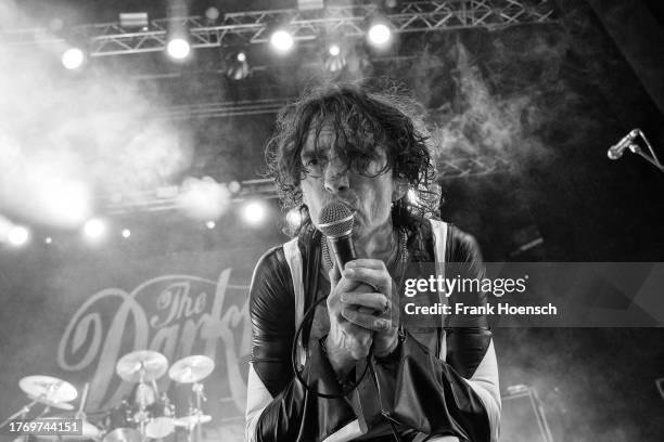 Singer Justin Hawkins of the British band The Darkness performs live on stage during a concert at the Admiralspalast on November 7, 2023 in Berlin,...
