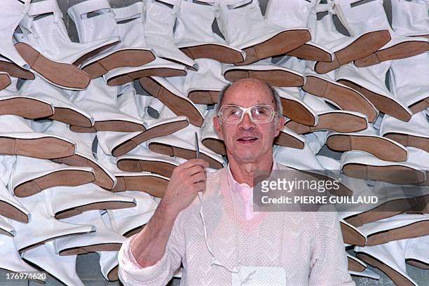 Photo taken on March 1, 1987 shows French fashion designer Andre Courreges, in his atelier in Paris. AFP PHOTO PIERRE GUILLAUD