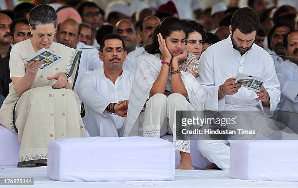 Congress leader and Chairperson of the National Advisory Council Sonia Gandhi and Robert and Priyanka Vadra with their daughter Miraya Vadra and...