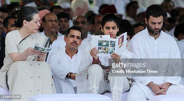 Congress leader and Chairperson of the National Advisory Council Sonia Gandhi, Robert Vadra , Miraya Vadra and Rahul Gandhi after paying tribute to...