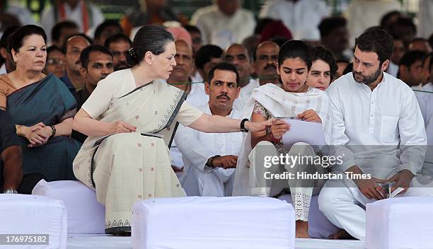 Congress leader and Chairperson of the National Advisory Council Sonia Gandhi, Robert Vadra , Miraya Vadra and Rahul Gandhi after paying tribute to...