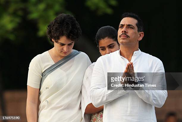 Priyanka Vadra along with her daughter Miraya Vadra and husband Robert Vadra pay tribute to former Indian Prime Minister Rajiv Gandhi on his birth...