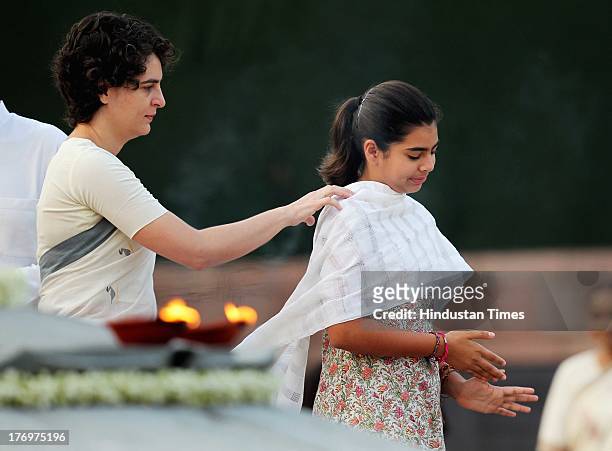 Priyanka Vadra along with her daughter Miraya Vadra pay tribute to former Indian Prime Minister Rajiv Gandhi on his birth anniversary at his memorial...