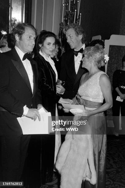 Mike Medavoy, Francine Racette, Donald Sutherland, and Marcia Rogers attend an event, presented by the American Film Institute, at the Beverly Hilton...