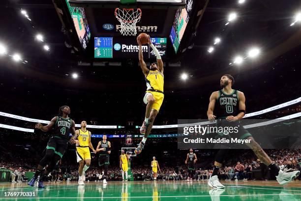 Obi Toppin of the Indiana Pacers dunks the ball against the Boston Celtics at TD Garden on November 01, 2023 in Boston, Massachusetts. The Celtics...