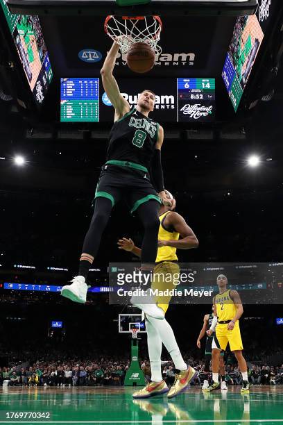 Kristaps Porzingis of the Boston Celtics dunks the ball against the Indiana Pacers at TD Garden on November 01, 2023 in Boston, Massachusetts. The...