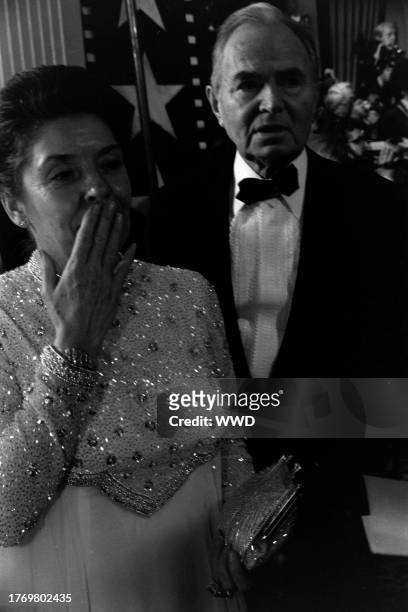 Clarissa Kaye and James Mason attend an American Film Institute event at the Beverly Hilton Hotel in Beverly Hills, California, on March 3, 1983.