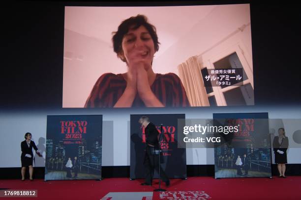 Iranian-French actress Zar Amir Ebrahimi is seen on a screen after winning the Award for the Best Actress during the closing ceremony of the 36th...