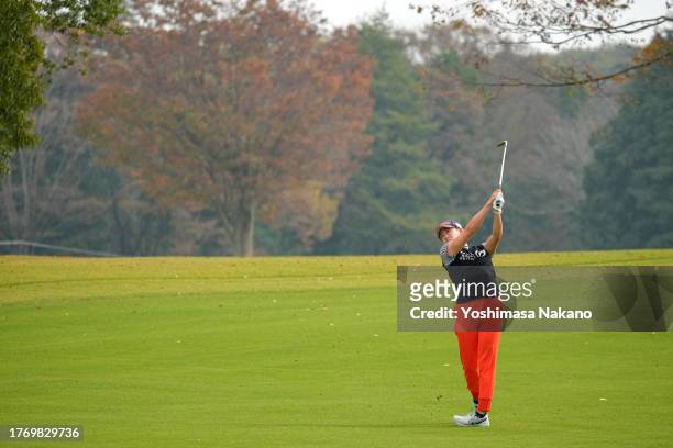 Akie Iwai of Japan hits her second shot on the 6th hole during the first round of the TOTO Japan Classic at the Taiheiyo Club's Minori Course on...