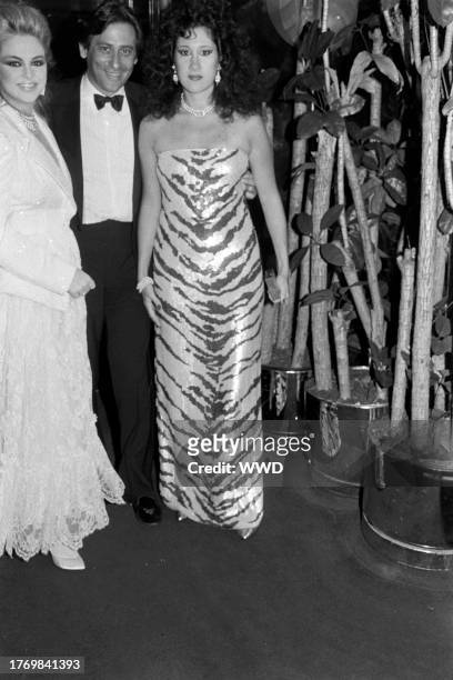 Cornelia Guest, Lewis Feder, and Francesca Braschi attend a party at Regine's, a nightclub in New York City, on November 28, 1984.