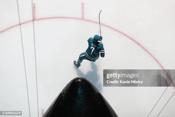 An overhead view as Nico Sturm of the San Jose Sharks takes the ice through the Shark Head before the game against the Philadelphia Flyers at SAP...