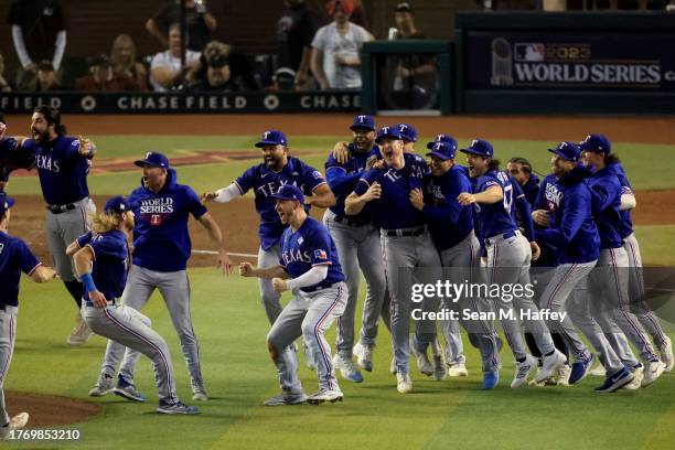 The Texas Rangers celebrate after beating the Arizona Diamondbacks 5-0 in Game Five to win the World Series at Chase Field on November 01, 2023 in...