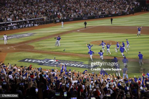 The Texas Rangers celebrate after beating the Arizona Diamondbacks 5-0 in Game Five to win the World Series at Chase Field on November 01, 2023 in...