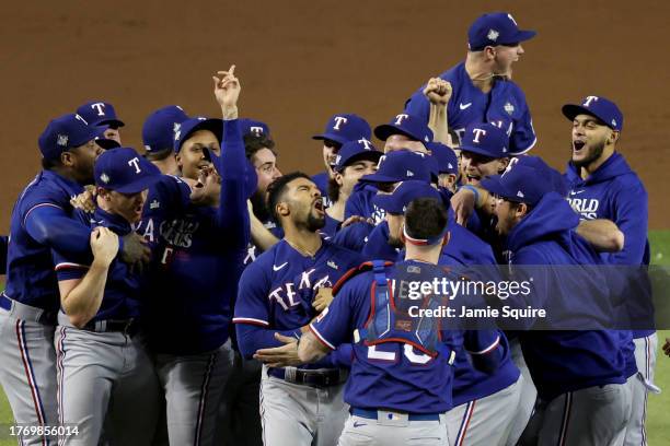 The Texas Rangers celebrate after beating the Arizona Diamondbacks 5-0 in Game Five to win the World Series at Chase Field on November 01, 2023 in...