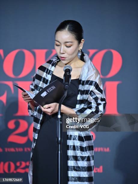 Japanese film director/novelist Momoko Ando steps on the stage to present the Audience Award during the closing ceremony of the 36th Tokyo...