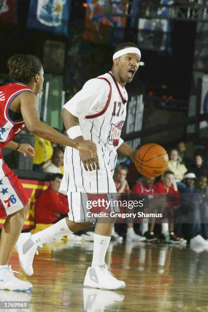 Jamie Foxx moves the ball upcourt during the Celebrity Game at NBA Jam Session during the 2003 NBA All Star Weekend at the Georgia World Congress...